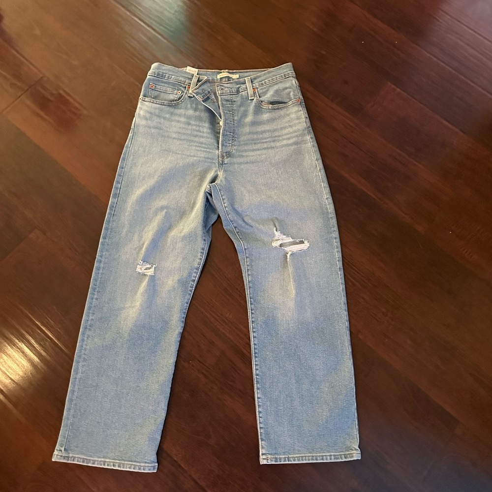 Levi's 501 light wash distressed denim jeans